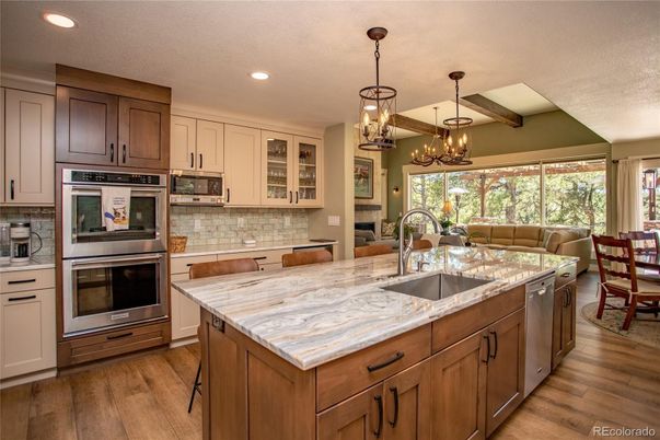 Chandelier, Interior, Kitchen, Pendant Lights, Recessed Lighting, Stainless Steel Appliances, Wooden Beams, Wood Texture Flooring