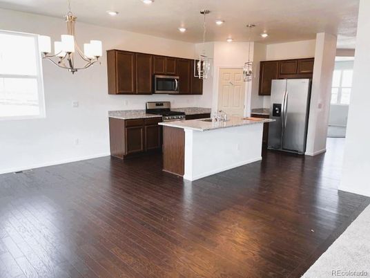 Chandelier, Interior, Kitchen, Pendant Lights, Recessed Lighting, Stainless Steel Appliances, Wood Texture Flooring