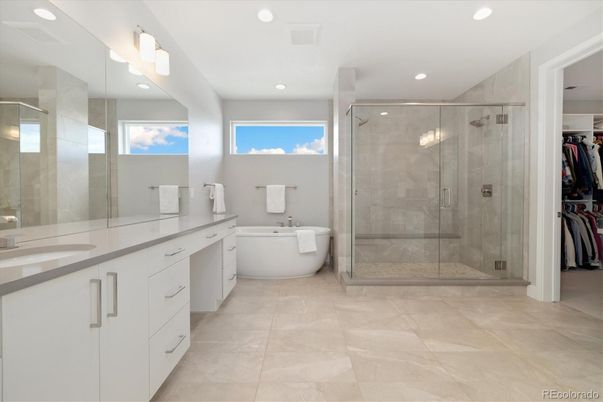 Bathroom, Dual Sink Vanities, Free Standing Baths, Glass Shower, Interior, Recessed Lighting, Walk-in Closets