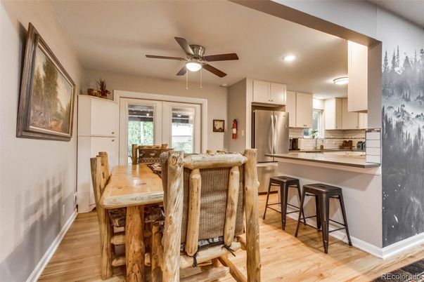 Dining room, Interior, Kitchen, Recessed Lighting, Stainless Steel Appliances, Wood Texture Flooring