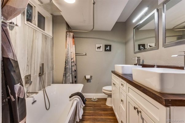 Bathroom, Dual Sink Vanities, Free Standing Baths, Interior, Wood Texture Flooring