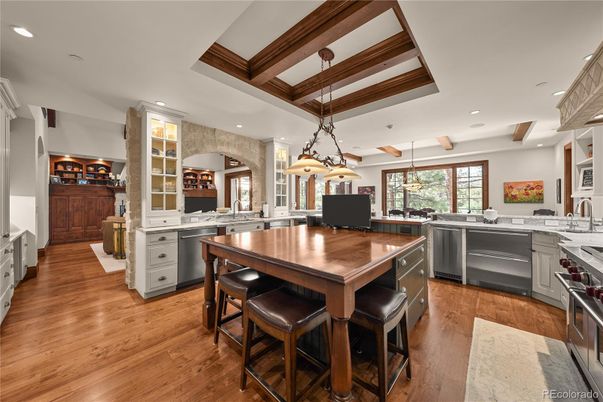 Dining room, Interior, Kitchen, Pendant Lights, Recessed Lighting, Stainless Steel Appliances, Wooden Beams, Wood Texture Flooring