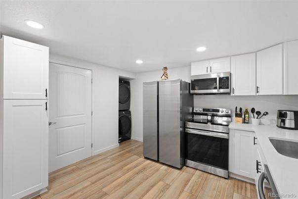 Interior, Kitchen, Recessed Lighting, Stainless Steel Appliances, Wood Texture Flooring