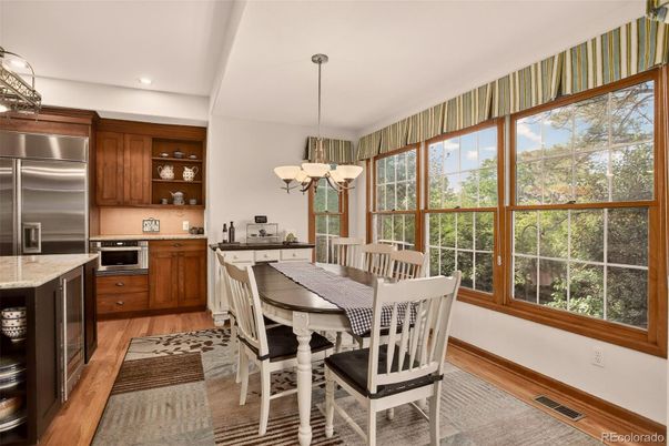 Dining room, Interior, Kitchen, Pendant Lights, Recessed Lighting, Stainless Steel Appliances, Wood Texture Flooring
