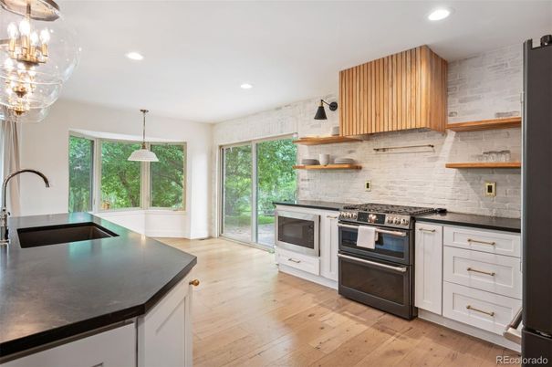 Interior, Kitchen, Pendant Lights, Recessed Lighting, Stainless Steel Appliances, Wood Texture Flooring