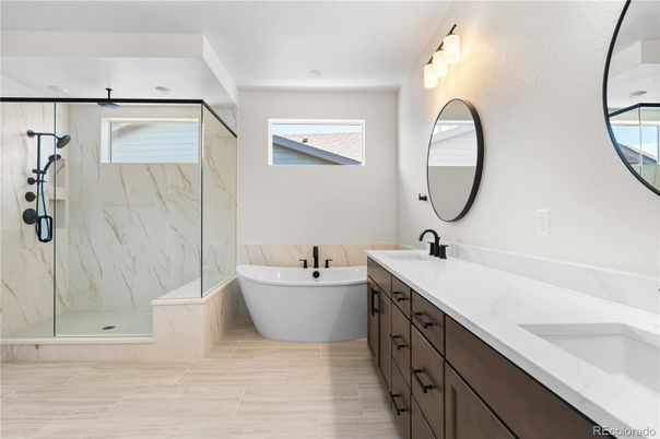 Bathroom, Dual Sink Vanities, Free Standing Baths, Glass Shower, Interior, Marble Walls