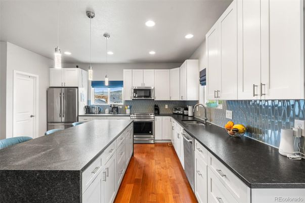 Interior, Kitchen, Pendant Lights, Recessed Lighting, Stainless Steel Appliances, Wood Texture Flooring