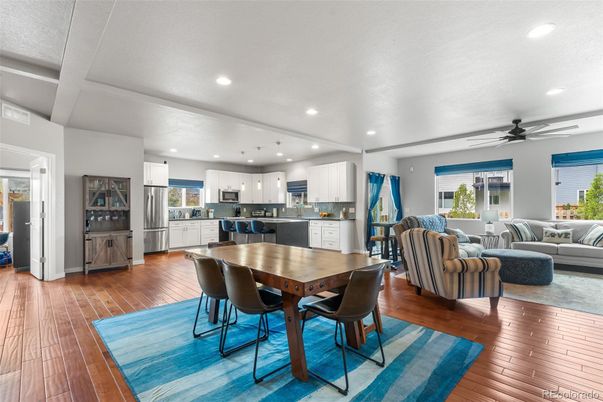Dining room, Interior, Kitchen, Living room, Recessed Lighting, Stainless Steel Appliances, Wood Texture Flooring