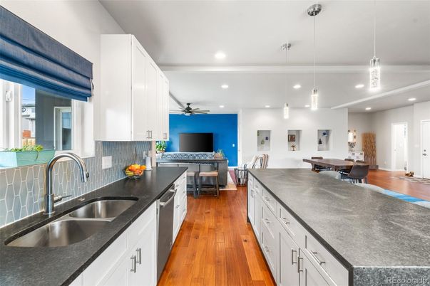 Dining room, Interior, Kitchen, Pendant Lights, Recessed Lighting, Stainless Steel Appliances, Wood Texture Flooring