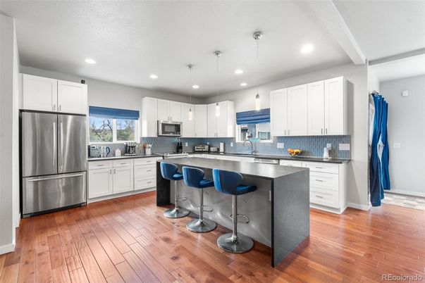 Interior, Kitchen, Pendant Lights, Recessed Lighting, Stainless Steel Appliances, Wood Texture Flooring
