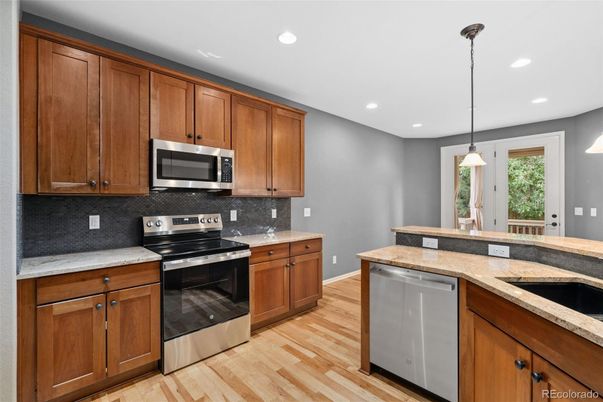 Interior, Kitchen, Pendant Lights, Recessed Lighting, Stainless Steel Appliances, Wood Texture Flooring
