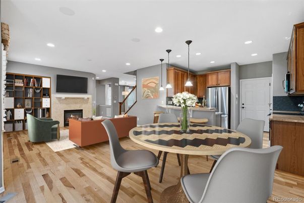Dining room, Fireplace, Interior, Kitchen, Living room, Pendant Lights, Recessed Lighting, Stainless Steel Appliances, Wood Texture Flooring