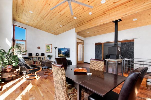 Dining room, Fireplace, Interior, Living room, Recessed Lighting, Wooden Ceilings, Wood Texture Flooring