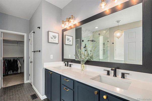 Bathroom, Chandelier, Dual Sink Vanities, Glass Shower, Interior, Marble Walls, Recessed Lighting