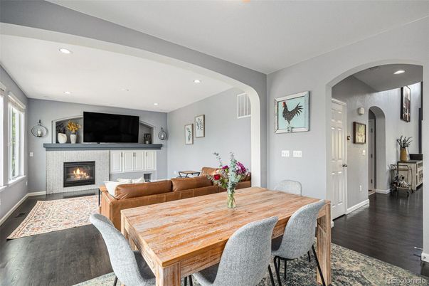 Dining room, Fireplace, Interior, Living room, Recessed Lighting, Wood Texture Flooring