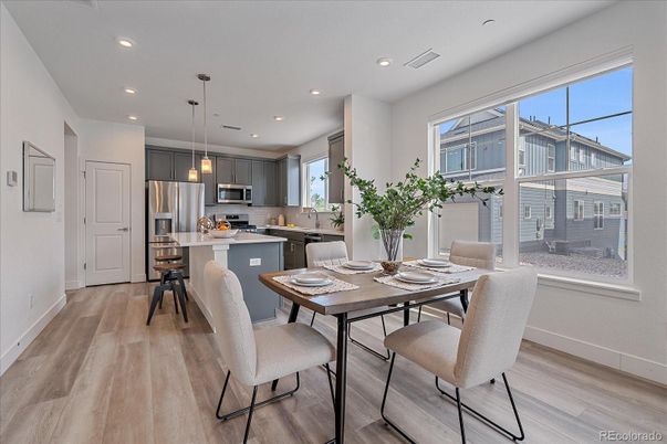 Dining room, Interior, Kitchen, Pendant Lights, Recessed Lighting, Stainless Steel Appliances, Wood Texture Flooring