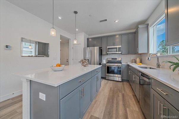 Interior, Kitchen, Pendant Lights, Recessed Lighting, Stainless Steel Appliances, Wood Texture Flooring