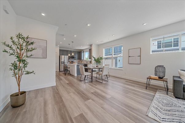 Dining room, Interior, Kitchen, Pendant Lights, Recessed Lighting, Stainless Steel Appliances, Wood Texture Flooring