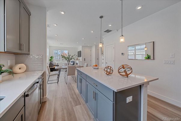 Dining room, Interior, Kitchen, Pendant Lights, Recessed Lighting, Stainless Steel Appliances, Wood Texture Flooring