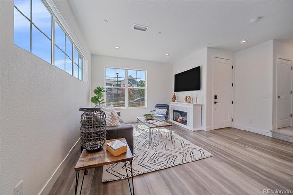 Fireplace, Interior, Living room, Recessed Lighting, Wood Texture Flooring
