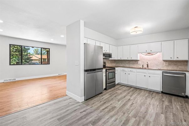 Interior, Kitchen, Recessed Lighting, Stainless Steel Appliances, Wood Texture Flooring