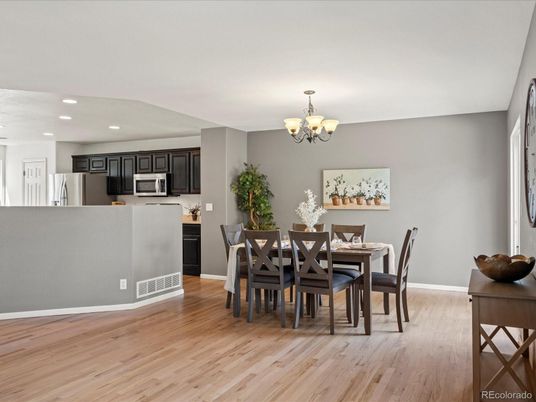 Chandelier, Dining room, Interior, Kitchen, Recessed Lighting, Stainless Steel Appliances, Wood Texture Flooring