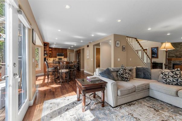 Dining room, Fireplace, Interior, Kitchen, Living room, Recessed Lighting, Wood Texture Flooring