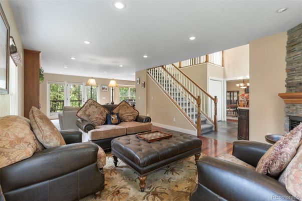 Chandelier, Fireplace, Interior, Living room, Recessed Lighting, Wood Texture Flooring