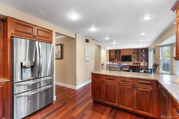 Dining room, Interior, Kitchen, Recessed Lighting, Stainless Steel Appliances, Wood Texture Flooring