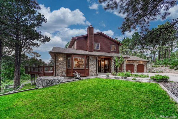 Attached, Backyard, Exterior, Facade, Brick Facade, Log Home