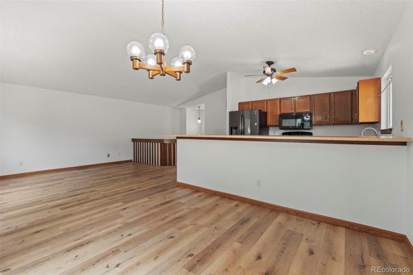 Chandelier, Empty room, Interior, Kitchen, Recessed Lighting, Wood Texture Flooring