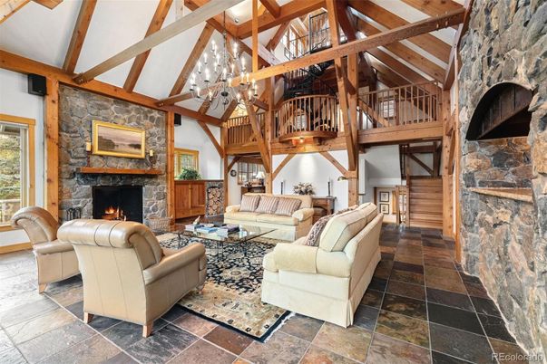 Chandelier, Fireplace, Interior, Living room, Stone Walls, Wooden Beams