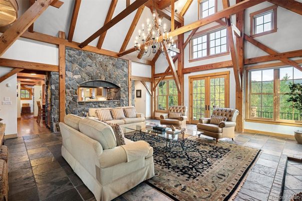 Chandelier, Fireplace, Interior, Living room, Stone Walls, Wooden Beams