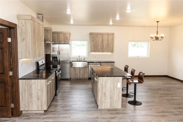 Chandelier, Interior, Kitchen, Recessed Lighting, Stainless Steel Appliances, Wood Texture Flooring