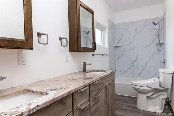 Bathroom, Dual Sink Vanities, Interior, Marble Walls, Wood Texture Flooring