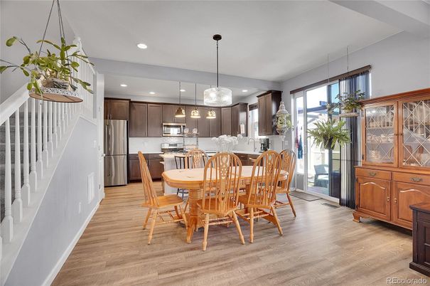 Dining room, Interior, Kitchen, Pendant Lights, Recessed Lighting, Stainless Steel Appliances, Wood Texture Flooring