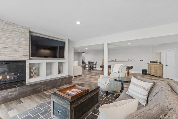 Fireplace, Interior, Living room, Recessed Lighting, Wood Texture Flooring