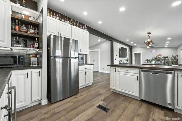 Interior, Kitchen, Recessed Lighting, Stainless Steel Appliances, Wood Texture Flooring