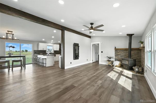 Dining room, Fireplace, Interior, Kitchen, Pendant Lights, Recessed Lighting, Stone Walls, Wood Texture Flooring