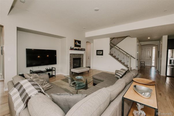 Fireplace, Interior, Living room, Recessed Lighting, Wood Texture Flooring