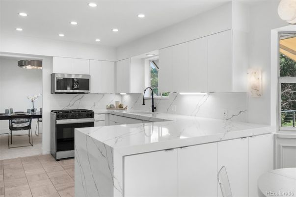 Interior, Kitchen, Marble, Marble Walls, Recessed Lighting, Stainless Steel Appliances