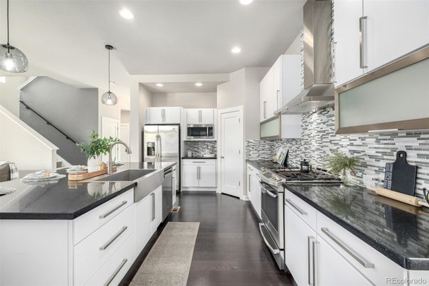 Interior, Kitchen, Pendant Lights, Recessed Lighting, Stainless Steel Appliances, Wood Texture Flooring