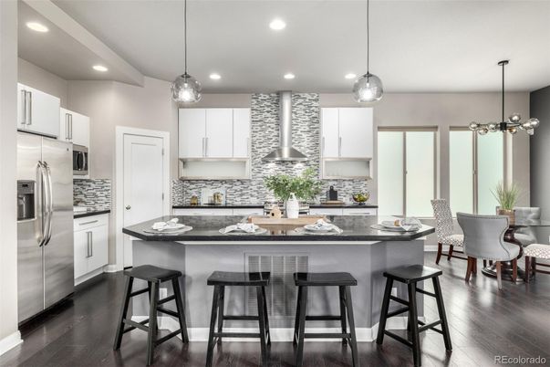 Dining room, Interior, Kitchen, Pendant Lights, Recessed Lighting, Stainless Steel Appliances, Wood Texture Flooring