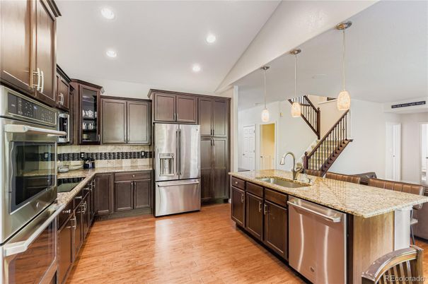 Interior, Kitchen, Pendant Lights, Recessed Lighting, Stainless Steel Appliances, Wood Texture Flooring