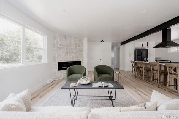 Fireplace, Interior, Kitchen, Living room, Pendant Lights, Recessed Lighting, Stone Walls, Wood Texture Flooring