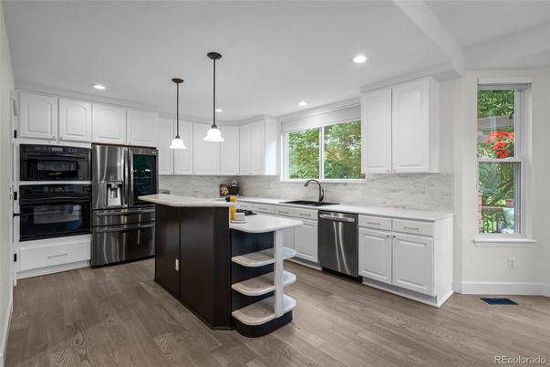 Interior, Kitchen, Pendant Lights, Recessed Lighting, Stainless Steel Appliances, Wood Texture Flooring