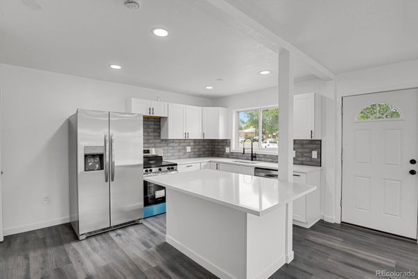 Interior, Kitchen, Recessed Lighting, Stainless Steel Appliances, Wood Texture Flooring