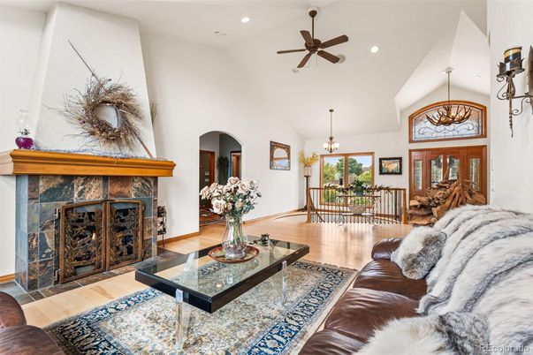 Chandelier, Dining room, Fireplace, Interior, Living room, Pendant Lights, Recessed Lighting, Wood Texture Flooring