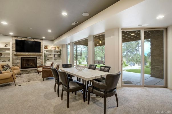 Dining room, Fireplace, Interior, Living room, Recessed Lighting, Stone Walls