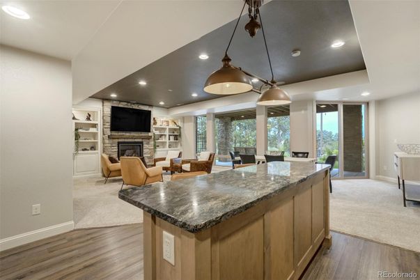 Dining room, Fireplace, Interior, Living room, Pendant Lights, Recessed Lighting, Wood Texture Flooring